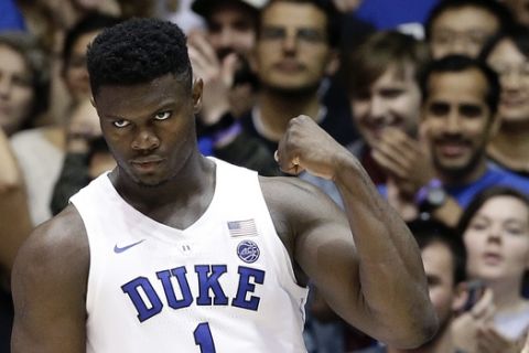 Duke's Zion Williamson (1) reacts following a play against Eastern Michigan during the first half of an NCAA college basketball game in Durham, N.C., Wednesday, Nov. 14, 2018. (AP Photo/Gerry Broome)