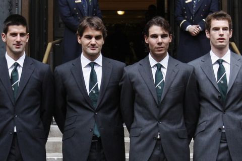 Tennis players, from left, Fernando Verdasco, Juan Martin del Potro, Novak Djokovic, Roger Federer, Rafael Nadal, Andy Murray, Nikolay Davydenko and Robin Soderling pose for a photograph in front of a hotel in Westminster, London Friday Nov. 20 2009. The ATP World Tour Finals start at the O2 Arena in London, Sunday Nov. 22, 2009. (AP Photo/Kirsty Wigglesworth)