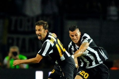 Juventus forward Alessandro Del Piero (L) celebrates after scoring with Juventus midfielder Davide Lanzafame   during their  Europa League second-leg play-off football match  Juventus  vs Sturm Graz at Olympic Stadium  in Turin on  August 26, 2010. AFP PHOTO / GIUSEPPE CACACE (Photo credit should read GIUSEPPE CACACE/AFP/Getty Images)