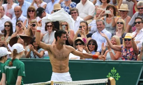 Tennis - Boodles Tennis Challenge - Stoke Park, Buckinghamshire - 25/6/15  Serbia's Novak Djokovic throws his shirt into the crowd  Action Images via Reuters / Paul Childs  Livepic   ORG XMIT: UKW1bs