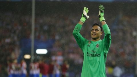 Real Madrid's goalkeeper Keylor Navas waves to his fans after the Champions League semifinal second leg soccer match between Atletico Madrid and Real Madrid at the Vicente Calderon stadium in Madrid, Spain, Wednesday, May 10, 2017. (AP Photo/Francisco Seco)