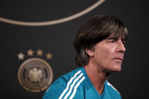 Coach of German national soccer team Joachim Loew attends a press conference ahead of Tuesday's UEFA Nations League soccer match between France and Germany at State De France, in Saint Denis, north of Paris, France, Monday, Oct. 15, 2018. (AP Photo/Francois Mori)