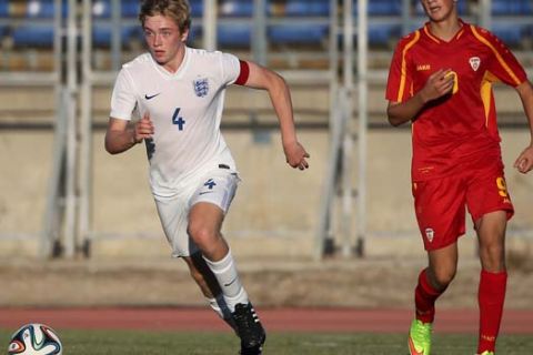 PAPHOS, CYPRUS - OCTOBER 27:  Tom Davies (L) from  England and Milan Ristovski from Macedonia in action during the England v Macedonia: UEFA U17 Qualifier match on October 27, 2014 in Paphos, Cyprus.  (Photo by Andrew Caballero-Reynolds/Getty Images)
