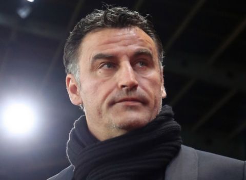 French head coach of Saint Etienne Christophe Galtier is seen prior to his League One soccer match against Rennes, in Rennes, western France, Friday, March 8, 2013. (AP Photo/David Vincent)