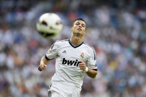 Real Madrid's Portuguese forward Cristiano Ronaldo gestures on August  19, 2012 during a Spanish league football match against Valencia at the Santiago Bernabeu stadium in Madrid.   AFP PHOTO/ DANI POZO        (Photo credit should read DANI POZO/AFP/GettyImages)