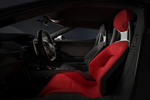 Inside, the Ford GT LM Editions interior features unique appointments including Alcantara®-wrapped carbon fiber seats with a matching red or blue drivers seat, and Ebony passenger seat with accent stitching that matches the drivers seat color, as well as the engine start button. Images provided by Multimatic Inc.