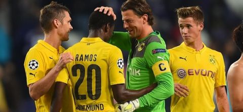Dortmund's Adrian Ramos (2L) celebrates at the end of the UEFA Champions League football match RSC Anderlecht vs Borussia Dortmund in Brussels, on October 1, 2014. AFP PHOTO/Emmanuel Dunand        (Photo credit should read EMMANUEL DUNAND/AFP/Getty Images)