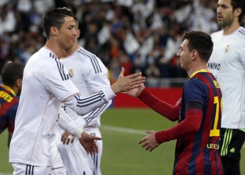 REFILE - CORRECTING NAME OF MATCH

Real Madrid's Cristiano Ronaldo (L) shakes hands with Barcelona's Lionel Messi before La Liga's second 'Clasico' soccer match of the season at Santiago Bernabeu stadium in Madrid March 23, 2014.  REUTERS/Stringer (SPAIN - Tags: SPORT SOCCER)
