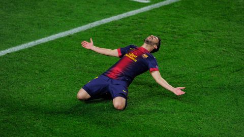 Barcelona's forward David Villa celebrates after scoring during the UEFA Champions League round of 16 second leg football match FC Barcelona against AC Milan at Camp Nou stadium in Barcelona on March 12, 2013. AFP PHOTO/ JOSEP LAGO        (Photo credit should read JOSEP LAGO/AFP/Getty Images)