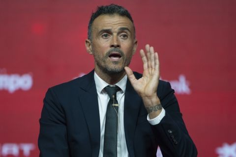 Spanish coach Luis Enrique talks to journalists during his official presentation as Spain new head coach in Las Rozas, outskirts Madrid, Thursday, July 19, 2018. (AP Photo/Francisco Seco)