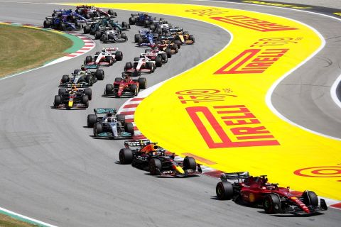 Ferrari driver Charles Leclerc of Monaco leads at the start of the Spanish Formula One Grand Prix at the Barcelona Catalunya racetrack in Montmelo, Spain, Sunday, May 22, 2022. (AP Photo/Joan Monfort)