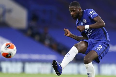 Chelsea's Antonio Rudiger passes the ball during the English Premier League soccer match between Chelsea and Norwich City at Stamford Bridge in London, England, Tuesday, July 14, 2020. (AP Photo/Richard Heathcote,Pool)