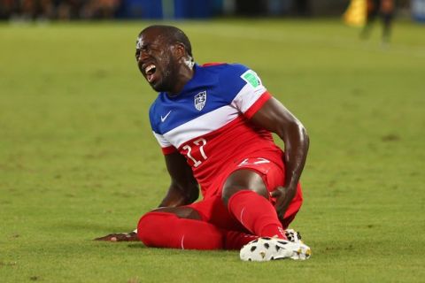 NATAL, BRAZIL - JUNE 16:  An injured Jozy Altidore of the United States lies on the field during the 2014 FIFA World Cup Brazil Group G match between Ghana and the United States at Estadio das Dunas on June 16, 2014 in Natal, Brazil.  (Photo by Michael Steele/Getty Images)