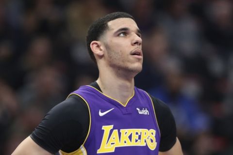 Los Angeles Lakers guard Lonzo Ball seen during the first half of an NBA basketball game against the Detroit Pistons, Monday, March 26, 2018, in Detroit. (AP Photo/Carlos Osorio)
