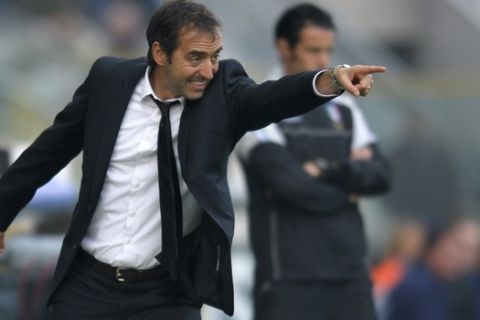 Cesenas coach Marco Giampaolo gestures during a serie A soccer match between Parma and Cesena at Parma's Tardini stadium, Italy, Sunday, Oct. 30, 2011. (AP Photo/Marco Vasini)