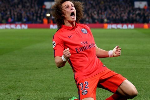 LONDON, ENGLAND - MARCH 11:  David Luiz of PSG celebrates after scoring a goal to level the scores at 1-1 during the UEFA Champions League Round of 16, second leg match between Chelsea and Paris Saint-Germain at Stamford Bridge on March 11, 2015 in London, England.  (Photo by Paul Gilham/Getty Images)