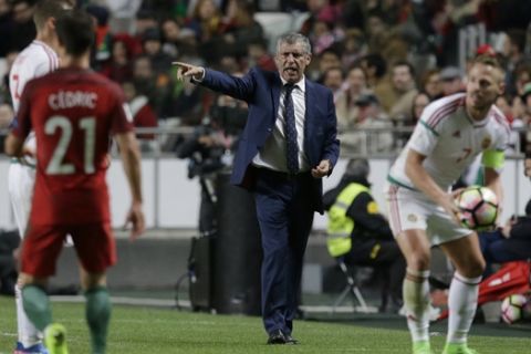 Portugal coach Fernando Santos, center, shouts and gestures during the World Cup Group B qualifying soccer match between Portugal and Hungary at the Luz stadium in Lisbon Saturday, March 25 2017. (AP Photo/Armando Franca)