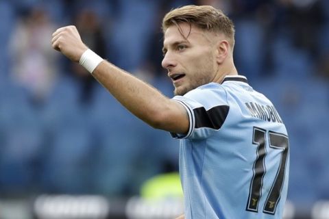 Lazio's Ciro Immobile celebrates after scoring his side's 3rd goal during a Serie A soccer match between Lazio and Spal at Rome's Olympic stadium, Sunday, Feb. 2, 2020. (AP Photo/Alessandra Tarantino)