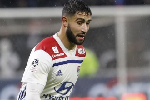 Lyon's Nabil Fekir controls the ball during the French League One soccer match between Lyon and Saint-Etienne at the Stade de Lyon near Lyon, France, Friday, Nov. 23, 2018. (AP Photo/Laurent Cipriani)