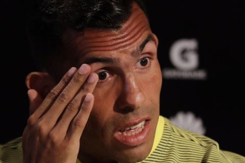 Carlos Tevez attends a press conference during his presentation as a new member of the Boca Juniors soccer team in Cardales, Argentina, Tuesday, Jan. 9, 2018. Tevez joins Boca Juniors for a third time in his career. (AP Photo/Natacha Pisarenko)
