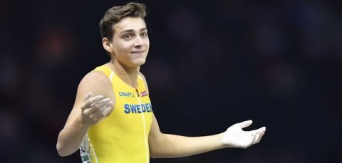 Sweden's Armand Duplantis reacts after an attempt in the men's pole vault final at the European Athletics Championships in the Olympic stadium in Berlin, Germany, Sunday, Aug. 12, 2018. (AP Photo/Martin Meissner)
