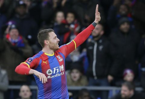 Crystal Palace's Connor Wickham celebrates after scoring the opening goal during an English FA Cup fourth round soccer match between Crystal Palace and Tottenham Hotspur at Selhurst Park in London, Sunday, Jan. 27, 2019. (AP Photo/Tim Ireland)