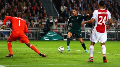 AMSTERDAM, NETHERLANDS - OCTOBER 03:  Cristiano Ronaldo of Real shoots and scores the first goal of the game during the UEFA Champions League Group D match between Ajax Amsterdam and Real Madrid at Amsterdam Arena on October 3, 2012 in Amsterdam, Netherlands.  (Photo by Dean Mouhtaropoulos/Getty Images)