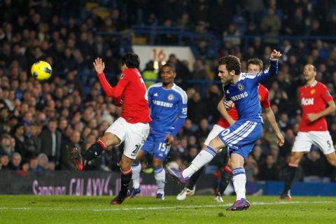 Chelsea's Spanish player Juan Mata (R) scores a goal during an English Premier League football match against Manchester United at Stamford Bridge in London on February 5, 2012. AFP PHOTO / IAN KINGTON

RESTRICTED TO EDITORIAL USE. No use with unauthorised audio, video, data, fixture lists, club/league logos or âliveâ services. Online in-match use limited to 45 images, no video emulation. No use in betting, games or single club/league/player publications. (Photo credit should read IAN KINGTON/AFP/Getty Images)