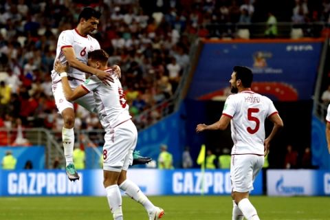 Tunisia's Fakhreddine Ben Youssef (8) celebrates with his teammates after scoring his side's first goal during the group G match between Panama and Tunisia at the 2018 soccer World Cup at the Mordovia Arena in Saransk, Russia, Thursday, June 28, 2018. (AP Photo/Darko Bandic)