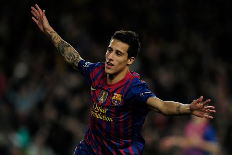 Barcelona's forward Christian Tello celebrates a goal during the Champions League round of sixteen second leg football match between FC Barcelona vs Bayer 04 Leverkusen on March 7, 2012 at the Camp Nou stadium in Barcelona.  AFP PHOTO/ JOSEP LAGO (Photo credit should read JOSEP LAGO/AFP/Getty Images)