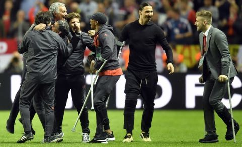 United manager Jose Mourinho, 2nd left, celebrates at the end of the soccer Europa League final between Ajax Amsterdam and Manchester United at the Friends Arena in Stockholm, Sweden, Wednesday, May 24, 2017. (AP Photo/Martin Meissner)