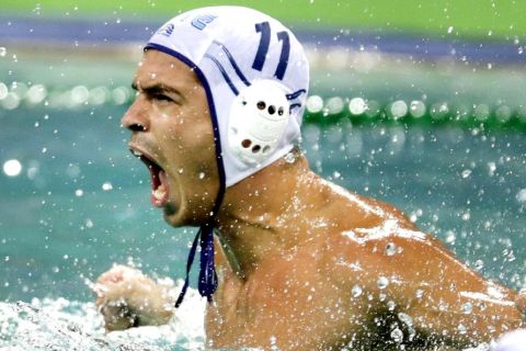Greece's Alex Gounas reacts after scoring against Brazil during a men's water polo preliminary round match at the 2016 Summer Olympics in Rio de Janeiro, Brazil, Friday, Aug. 12, 2016. (AP Photo/Sergei Grits)