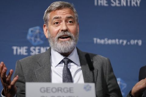 US actor and activist George Clooney speaks at a press conference about South Sudan in London, Thursday, Sept. 19, 2019. The largest multinational oil consortium in South Sudan is "proactively participating in the destruction" of the country, the actor George Clooney and co-founder of The Sentry watchdog group told The Associated Press this week. (AP Photo/Alastair Grant)