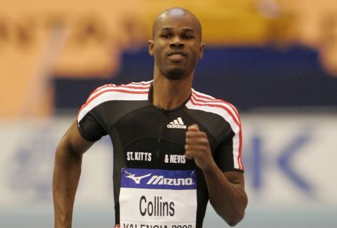 St. Kitts and Nevis' Kim Collins crosses the finish line of a Men's 60m heat during the Athletics World Indoor Championships  in Valencia, Spain, Friday, March 7, 2008. (AP Photo/Michael Probst)