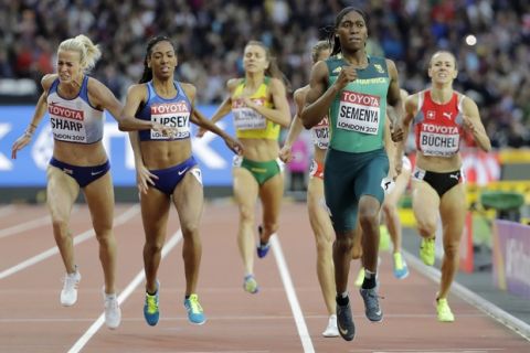 Britain's Lynsey Sharp, United States' Charlene Lipsey, South Africa's Caster Semenya and Switzerland's Selina Buechel race for the line in a Women's 800m semifinal during the World Athletics Championships in London Friday, Aug. 11, 2017. (AP Photo/David J. Phillip)