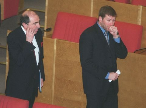 Controversial tycoons Boris Berezovsky, left, and Roman Abramovich walk in a session hall during a break in the State Duma, Russian parliament's lower house, in Moscow, Tuesday, January 18, 2000. Berezovsky and Abramovich are among the newly elected lawmakers. (AP Photo)