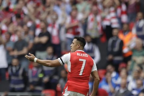 Arsenal's Alexis Sanchez celebrates after scoring the opening goal during the English FA Cup final soccer match between Arsenal and Chelsea at the Wembley stadium in London, Saturday, May 27, 2017. (AP Photo/Matt Dunham)