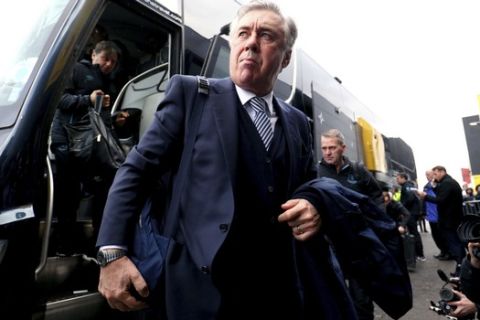 Everton manager Carlo Ancelotti arrives at the stadium ahead of the English Premier League soccer match against Watford, at Vicarage Road in Watford, England, Saturday Feb. 1, 2020. (Jonathan Brady/PA via AP)