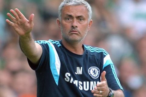 Chelsea caoch Jose Mourinho gestures during  the preseason soccer match between SV  Werder Bremen and FC Chelsea in Bremen , Germany, Sunday Aug. 3, 2014.   (AP Photo/dpa, Carmen Jaspersen) Germany Soccer Bremen Chelsea