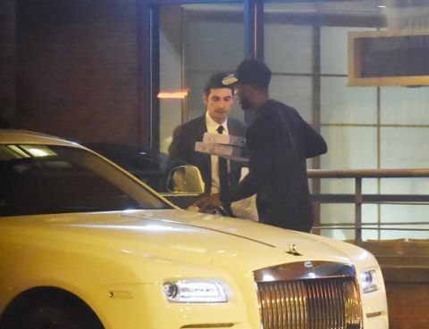Daniel Sturridge parks his £200k Rolls Royce in a bus stop while getting a worker from il Forno restaurant to carry his takeaway out for him 