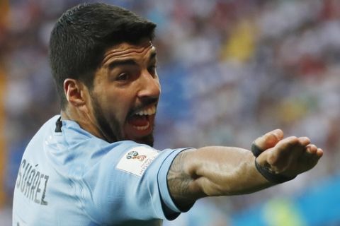 Uruguay's Luis Suarez gestures during the group A match between Uruguay and Saudi Arabia at the 2018 soccer World Cup in Rostov Arena in Rostov-on-Don, Russia, Wednesday, June 20, 2018. (AP Photo/Darko Vojinovic)