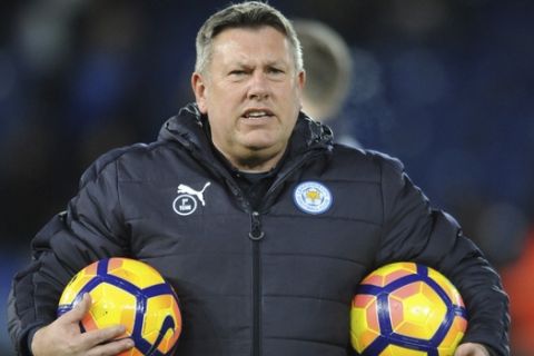 FILE- In this Monday, Feb. 27, 2017 file photo, Leicester caretaker manager Craig Shakespeare during the English Premier League soccer match between Leicester City and Liverpool at the King Power Stadium in Leicester, England. Craig Shakespeare will remain in charge of Leicester until the end of the season. He has the task of keeping the ailing champions in the Premier League following Claudio Ranieri's firing. (AP Photo/Rui Vieira, File)