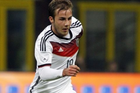 Germany's Mario Gotze during a friendly soccer match between Italy and Germany at the San Siro stadium in Milan, Italy, Friday, Nov. 15, 2013. (AP Photo/Felice Calabro')