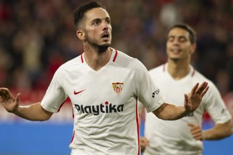 Sevilla's Pablo Sarabia celebrates after scoring during a Spanish Copa del Rey soccer match between Sevilla and FC Barcelona in Seville, Spain, Wednesday Jan. 23, 2019. (AP Photo/Miguel Morenatti)