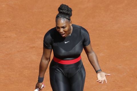 Serena Williams of the U.S. screams during her first round match of the French Open tennis tournament against Krystina Pliskova of the Czech Republic at the Roland Garros stadium in Paris, France, Tuesday, May 29, 2018. (AP Photo/Michel Euler)