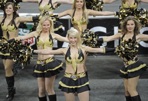 Grid girls perform during the Race of Champions at the arena in Duesseldorf, western Germany, Sunday, Dec. 4, 2011.(AP Photo/Martin Meissner)