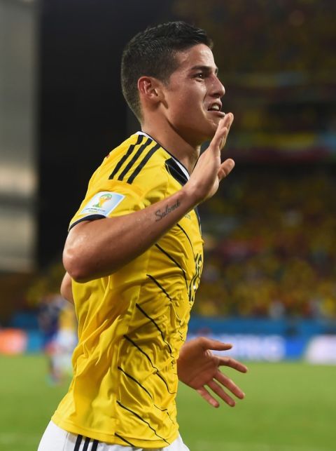 CUIABA, BRAZIL - JUNE 24:  James Rodriguez of Colombia celebrates scoring his team's fourth goal during the 2014 FIFA World Cup Brazil Group C match between Japan and Colombia at Arena Pantanal on June 24, 2014 in Cuiaba, Brazil.  (Photo by Christopher Lee/Getty Images)