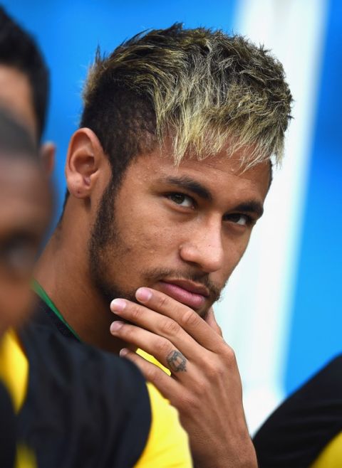 BRASILIA, BRAZIL - JULY 12: An injured Neymar of Brazil looks on from the bench prior to the 2014 FIFA World Cup Brazil Third Place Playoff match between Brazil and the Netherlands at Estadio Nacional on July 12, 2014 in Brasilia, Brazil.  (Photo by Jamie McDonald/Getty Images)