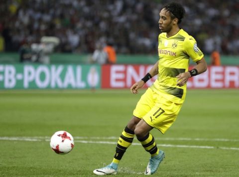 Dortmund's Pierre-Emerick Aubameyang scores his side's 2nd goal during the German soccer cup final match between Borussia Dortmund and Eintracht Frankfurt in Berlin, Germany, Saturday, May 27, 2017. (AP Photo/Michael Sohn)