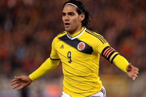 Colombia's Radamel Falcao celebrates after scoring against Belgium during a friendly soccer match at the King Baudouin stadium in Brussels on Thursday, Nov. 14, 2013. (AP Photo/Geert Vanden Wijngaert)